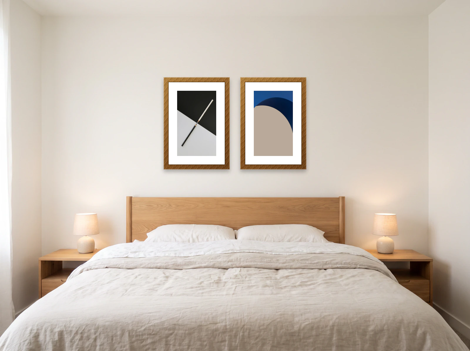 Gallery wall template above a bed: two 50 × 70 cm oak frames centred over a wooden headboard with linen bedding
