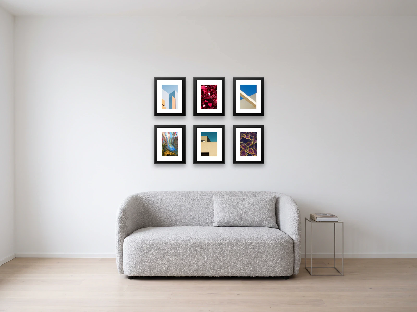 Gallery wall template above a loveseat: six 24 × 30 cm black frames in two rows of three on a white wall
