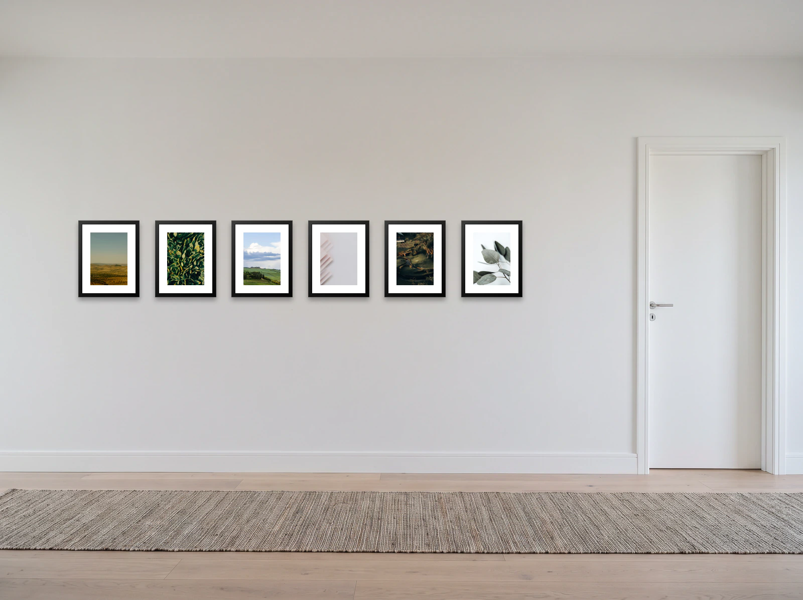 Hallway gallery wall template: six 30 × 40 cm black frames in a single row along a white corridor wall