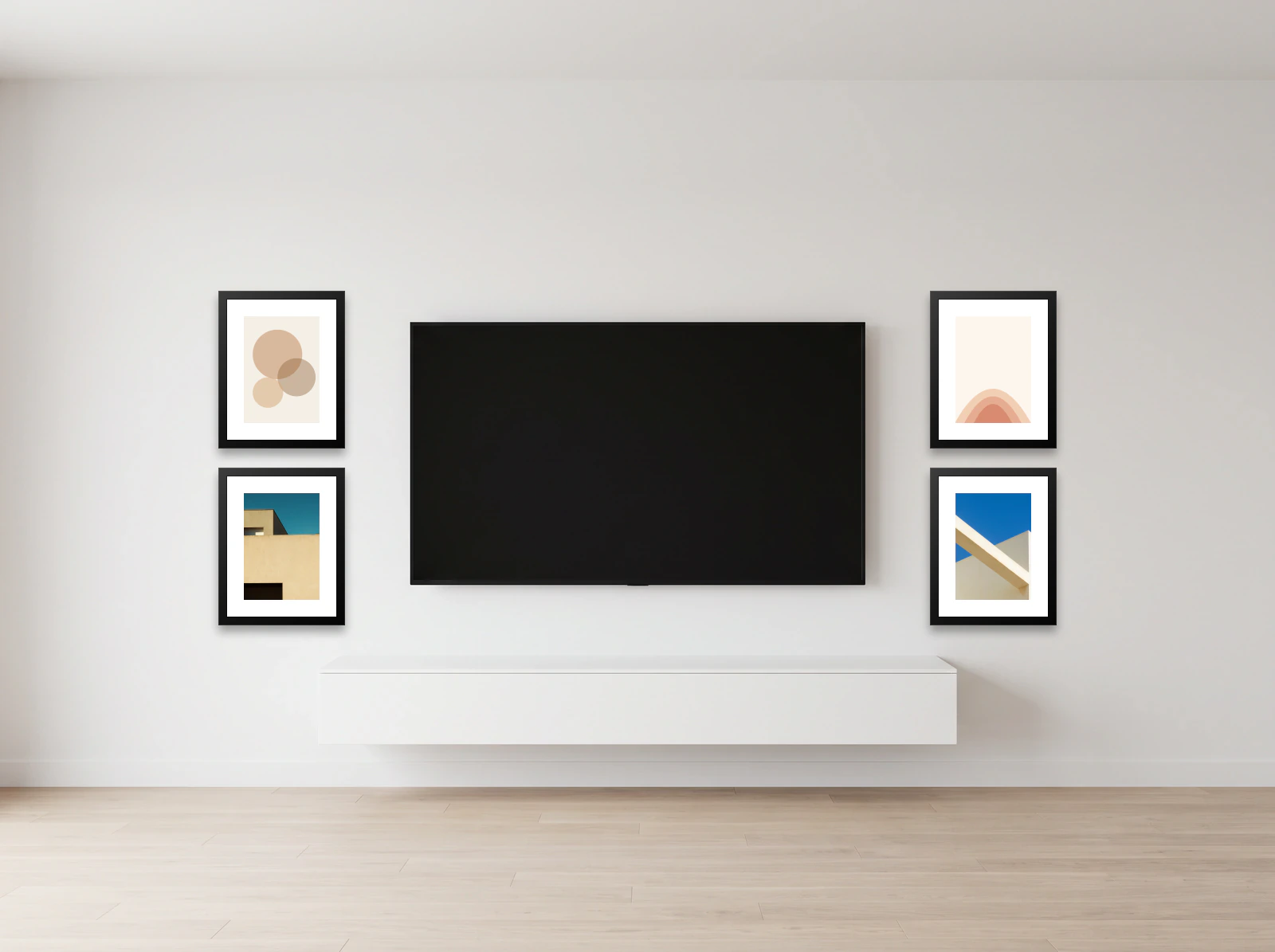 TV gallery wall template: four 40 × 50 cm frames stacked two either side of a wall-mounted television on a white wall